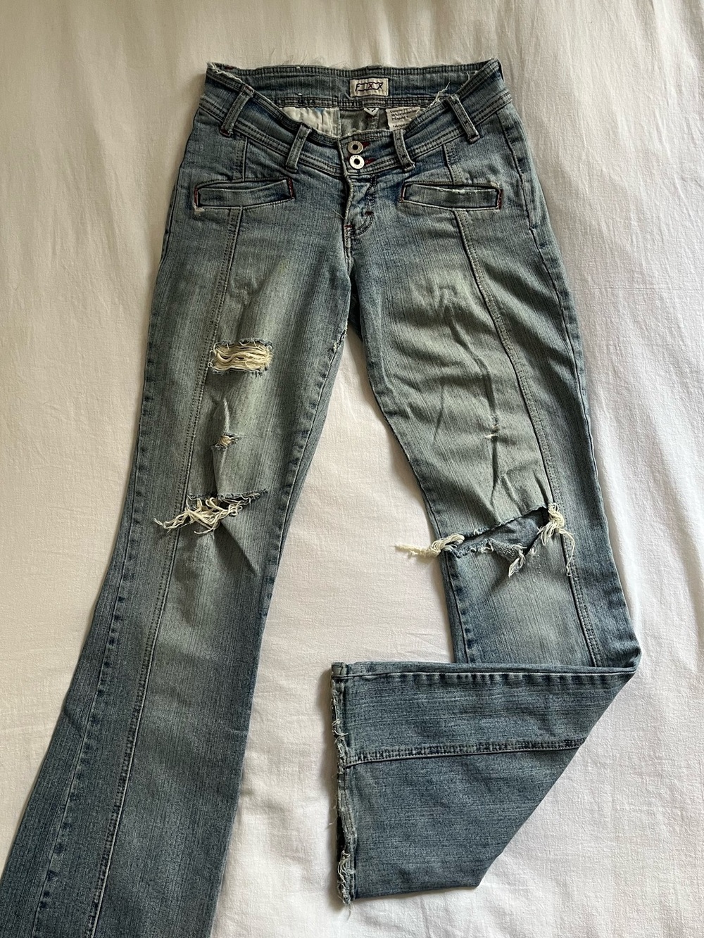 Distressed Bootcut Women’s Blue Jeans
